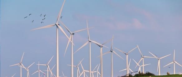 Clifford Chance Advises Santander Bank Polska and CaixaBank on Wind Farm Portfolio Financing for Elawan Energy